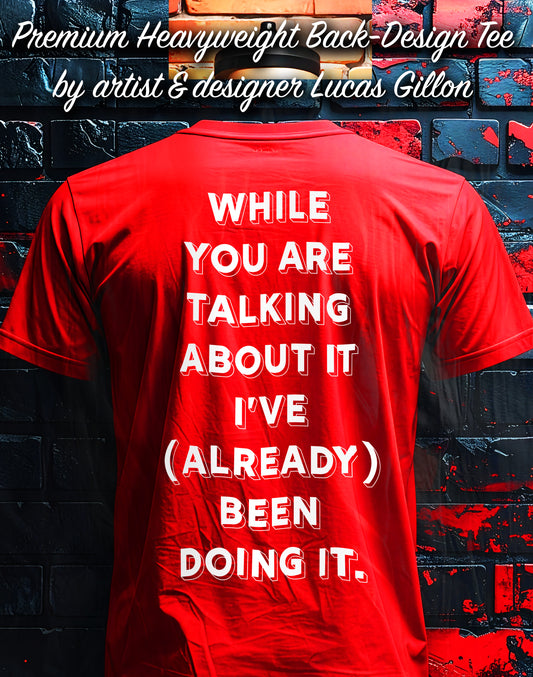 Red Unisex Heavy Premium Back-Design Tee "Already Doing It" by Designer and Artist Lucas Gillon