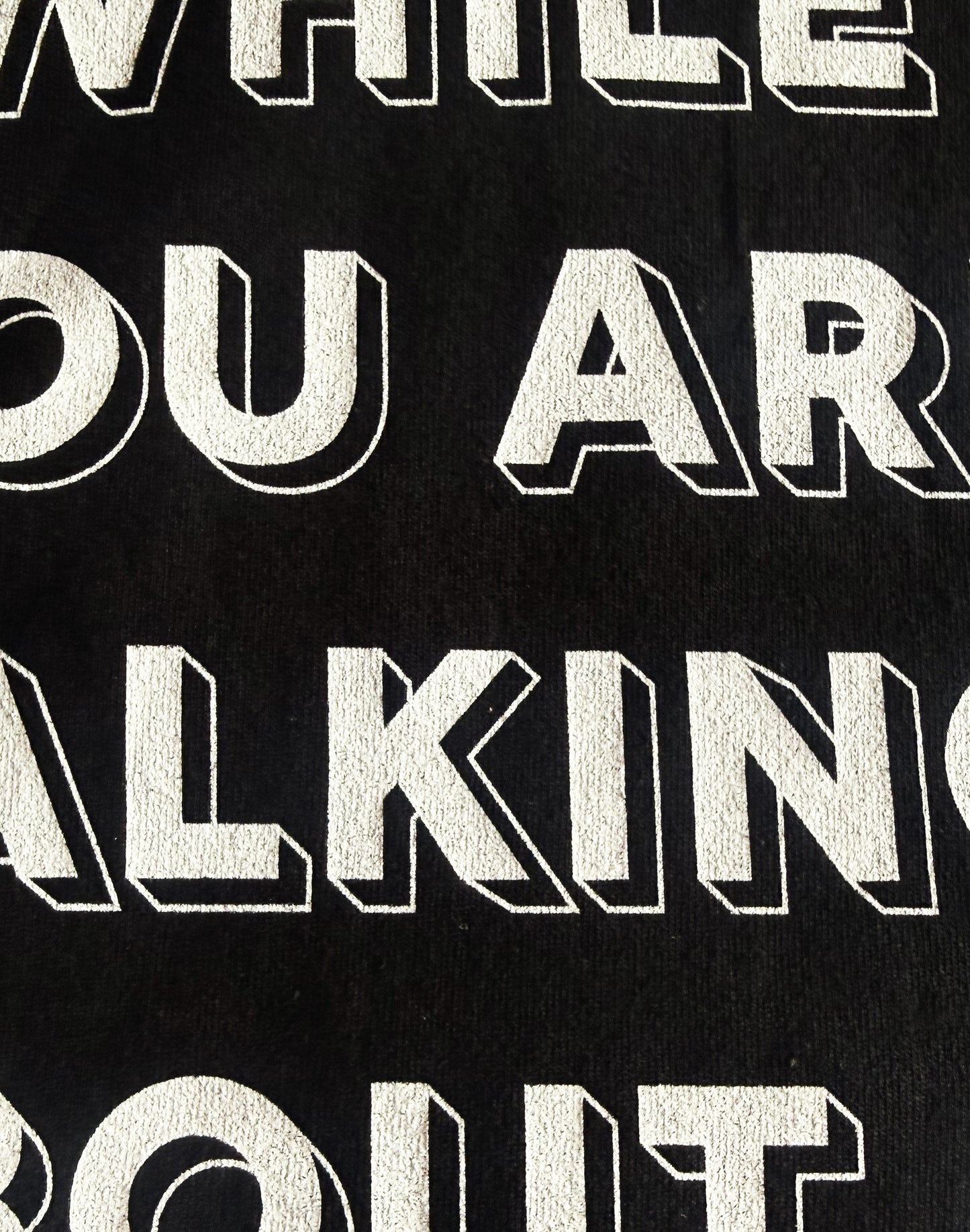 Black Unisex Heavy Premium Back-Design Tee "Already Doing It" by Designer and Artist Lucas Gillon