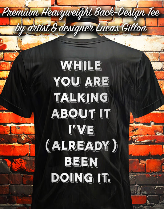 Black Unisex Heavy Premium Back-Design Tee "Already Doing It" by Designer and Artist Lucas Gillon
